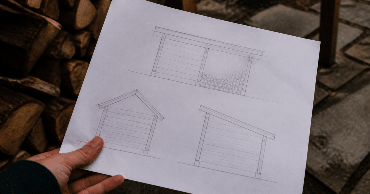 Document papier montrant plans construction abri rangement bois